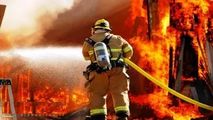 آتش سوزی گسترده در یک مجتمع تجاری نزدیک حرم امام رضا (ع)+ فیلم